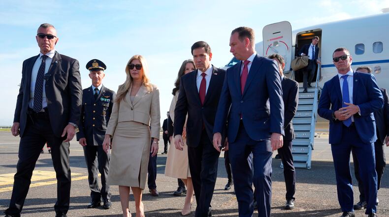 US Secretary of State Marco Rubio meets U.S. Ambassador to the Holy See Brian Burch upon hi arrival at Rome's Ciampino airport for a two-day visit to Italy and the Vatican, Thursday, May 7, 2026. (AP Photo/Andrew Medichini, Pool)