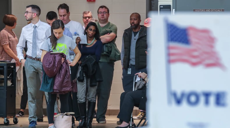 November 6, 2018 Atlanta : Voters waited over an hour to vote at Henry W. Grady High School at 29 Charles Allen Dr NE, in Atlanta on Tuesday Nov. 6, 2018. Metro Atlanta polling places reported steady lines as voters went to the polls Tuesday. Georgia voters were asked Nov. 6 whether the state constitution should be amended to give a 10-year, $200 million boost to land conservation, solidify the states commitment to crime victims and cut timberland taxes. Five proposed amendments appeared on the ballot, which most notably settles the long and hard-fought races for governor and other key offices. JOHN SPINK/JSPINK@AJC.COM