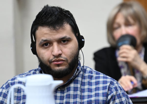 Jose Ibarra listens through an interpreter during his trial at Athens-Clarke County Superior Court, Friday, November 15, 2024, in Athens. Ibarra was charged in the February killing of Laken Hope Riley, whose body was found on the University of Georgia campus. (Hyosub Shin / AJC)