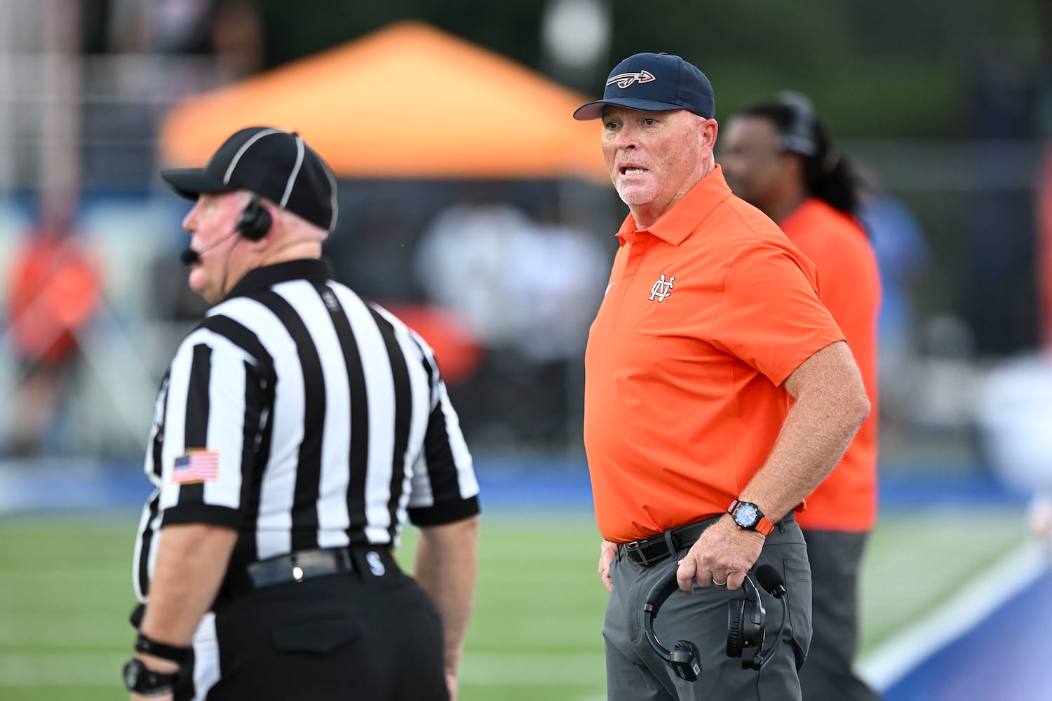 North Cobb head coach Shane Queen reacts to a referees call during the first half of play Friday, August 22, 2025 at McEachern.  (Daniel Varnado/For the Atlanta Journal-Constitution)