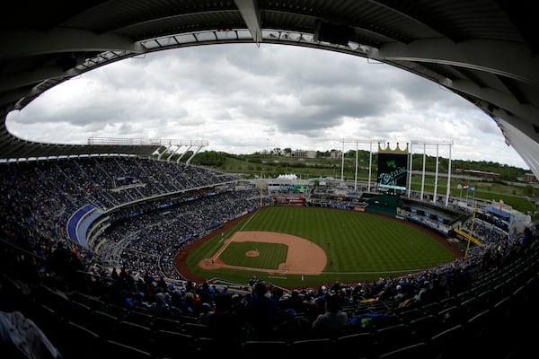 FILE - Fans watch during a baseball game between the Kansas City Royals and the Minnesota Twins Sunday, April 30, 2017, in Kansas City, Mo. (AP Photo/Charlie Riedel, File)