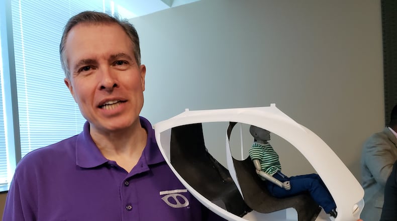 Transit X founder Mike Stanley has proposed a private transit system in metro Atlanta, with passengers traveling in four-person “flying pods” hanging from overhead monorails that would run alongside roads. The proposal faces new questions with revelations that Stanley is a convicted sex offender who changed his name to distance himself from his past. MATT KEMPNER / AJC