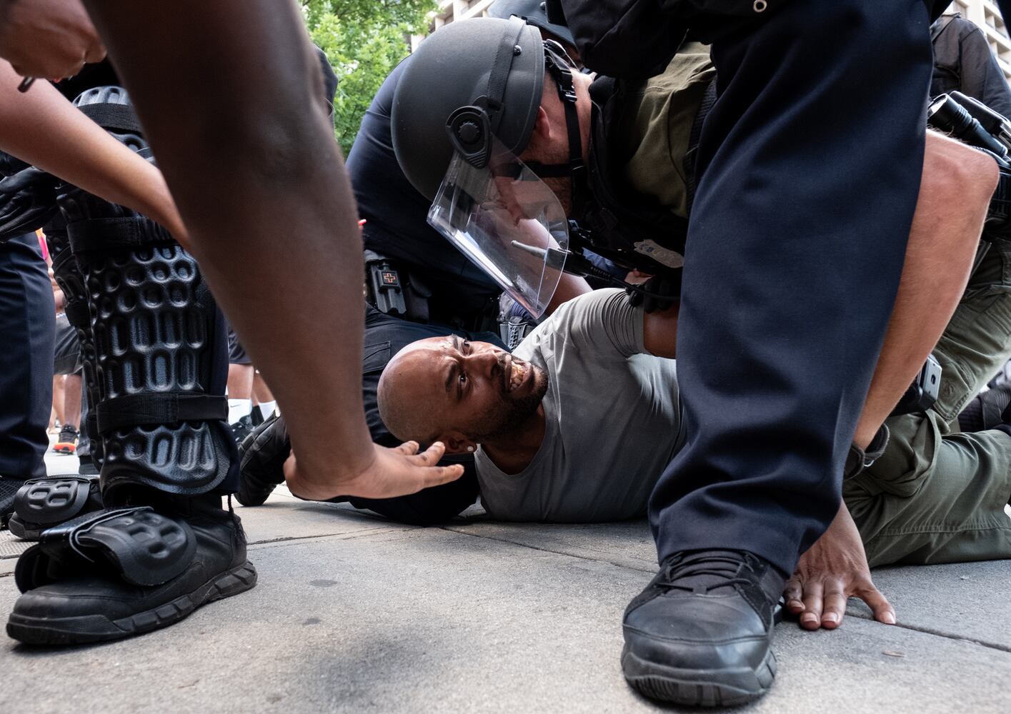 Behind the lens --  Protests: Taken FOR THE AJC