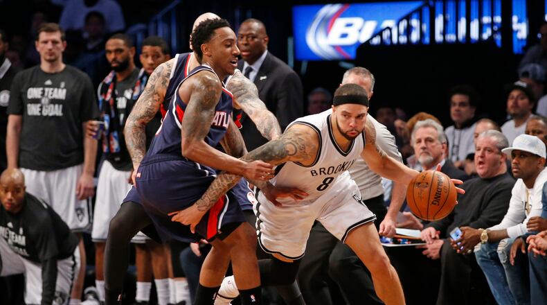 Atlanta Hawks guard Jeff Teague (0) defends Brooklyn Nets guard Deron Williams (8) in the second half of Game 4 of a first round NBA playoff basketball game, Monday, April 27, 2015, in New York. (AP Photo/Kathy Willens) Brooklyn's Deron Williams had struggled in this series until scoring 35 points on Monday. (AP photo)