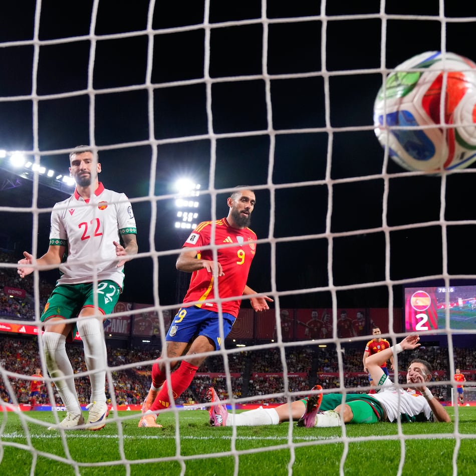 Bulgaria's Atanas Chernev, center, scores an own goal during the World Cup 2026 group E qualifying soccer match between Spain and Bulgaria in Valladolid, Spain, Tuesday, Oct. 14, 2025. (AP Photo/Manu Fernandez)