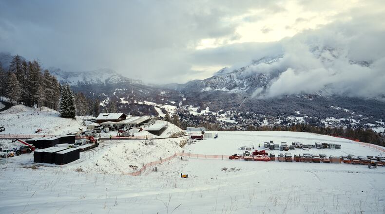 A view of the work at the finish area of the Olympia delle Tofane course where the women's Alpine skiing will be contested at the 2026 Milan Cortina Winter Olympics, in Cortina D'Ampezzo, Italy, Friday, Nov. 21, 2025. (AP Photo/Andrew Medichini)