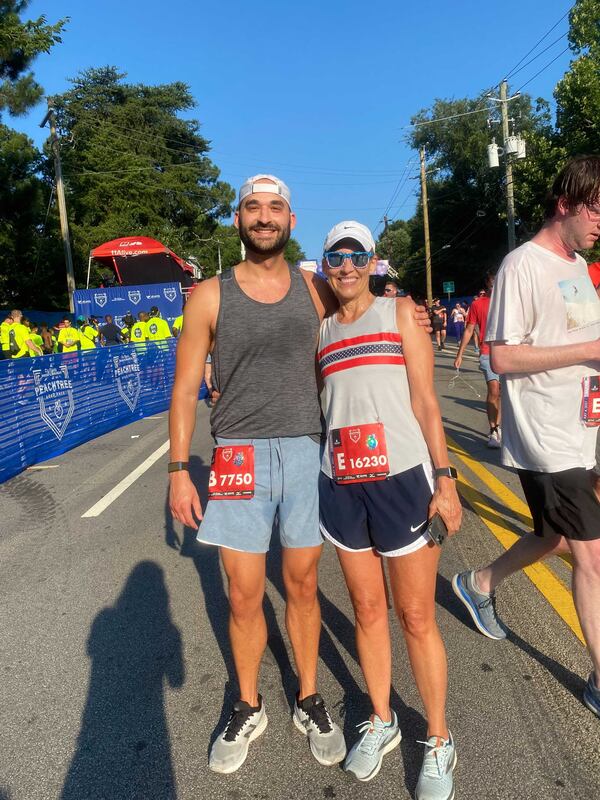 Sharon Silmbee and her son Aaron ran the race for the first time together on Sunday. (Photo: Sarah Kallis/AJC)