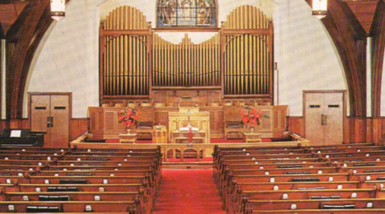 The interior of the old Decatur First United Methodist Church chapel with stained glass window above the organ pipes. Both the chapel and window date to 1899. Courtesy Decatur First United Methodist Church