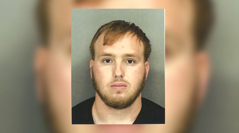 Daniel Payton Brinson was charged with the murders of two teenagers in Middle Georgia following his arrest in Marietta on multiple felony drug counts.