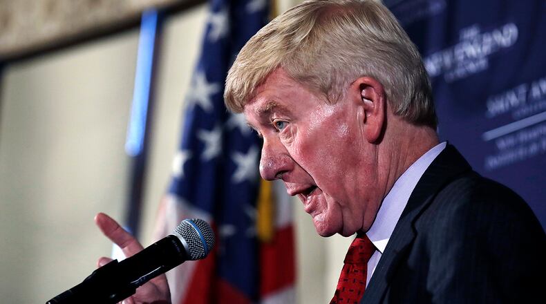 Former Massachusetts Gov. William Weld gestures during a New England Council 'Politics & Eggs' breakfast in Bedford, N.H., Friday, Feb. 15, 2019. Weld announced he's creating a presidential exploratory committee for a run in the 2020 election. (AP Photo/Charles Krupa)