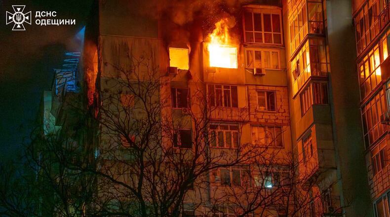 In this photo provided by the Ukrainian Emergency Service, a fire is seen in a residential building following a Russian drone attack in Odesa, Ukraine, Friday, May 1, 2026. (Ukrainian Emergency Service via AP)