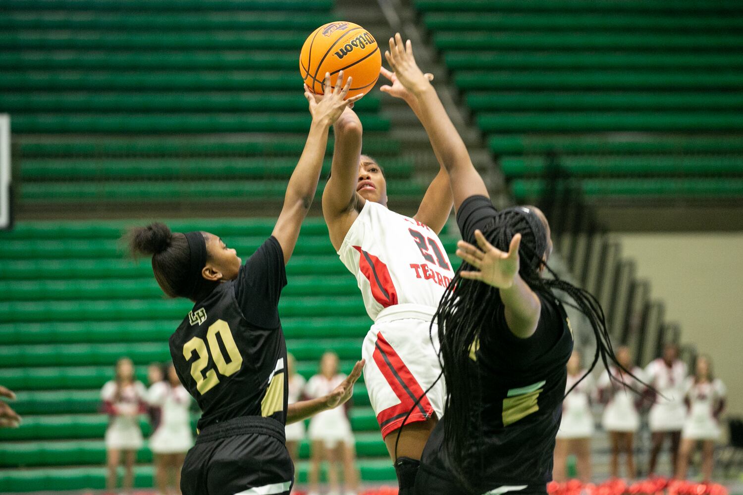 Photos: High school basketball state tourney continues