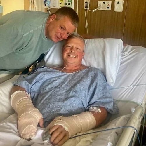 Officer Jay Hood saved the life of his friend Chad Wombles, a Wrightsville firefighter, when Wombles was attacked by a man with a sword. (Courtesy of Wombles family)