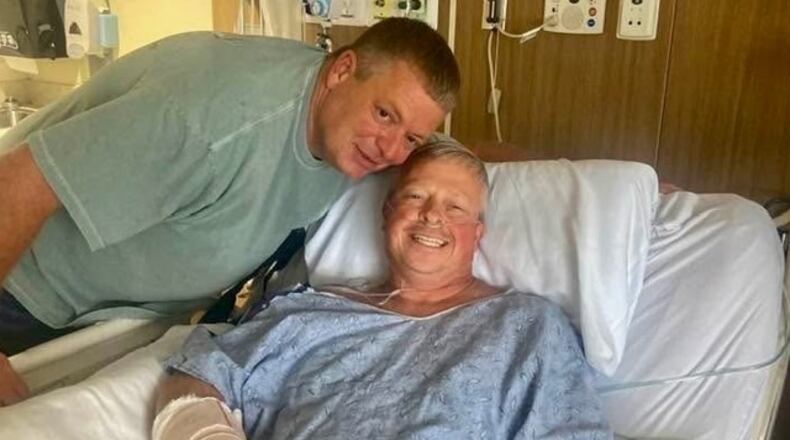 Officer Jay Hood saved the life of his friend Chad Wombles, a Wrightsville firefighter, when Wombles was attacked by a man with a sword. (Courtesy of Wombles family)