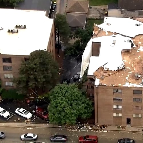 This frame grab from aerial video shows a building in Stickney, Illinois, after its roof was damaged by the severe storms that struck the Chicago area on Wednesday, June 10, 2026. (AP Photo/Courtesy WMAQ-TV in Chicago) TELEVISION OUT