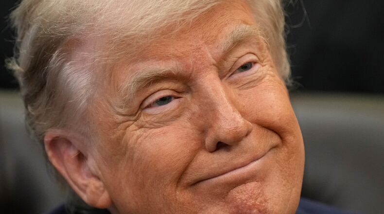 President Donald Trump attends an event about loosening a federal refrigerant rule, in the Oval Office at the White House, Thursday, May 21, 2026, in Washington. (AP Photo/Jacquelyn Martin)
