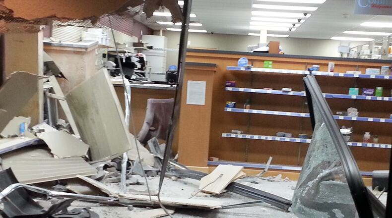 An allegedly drunk driver crashed his car through the front of a northeast Atlanta pharmacy early Friday, then walked away from the wreckage to a nearby bar, where he continued drinking, police said.