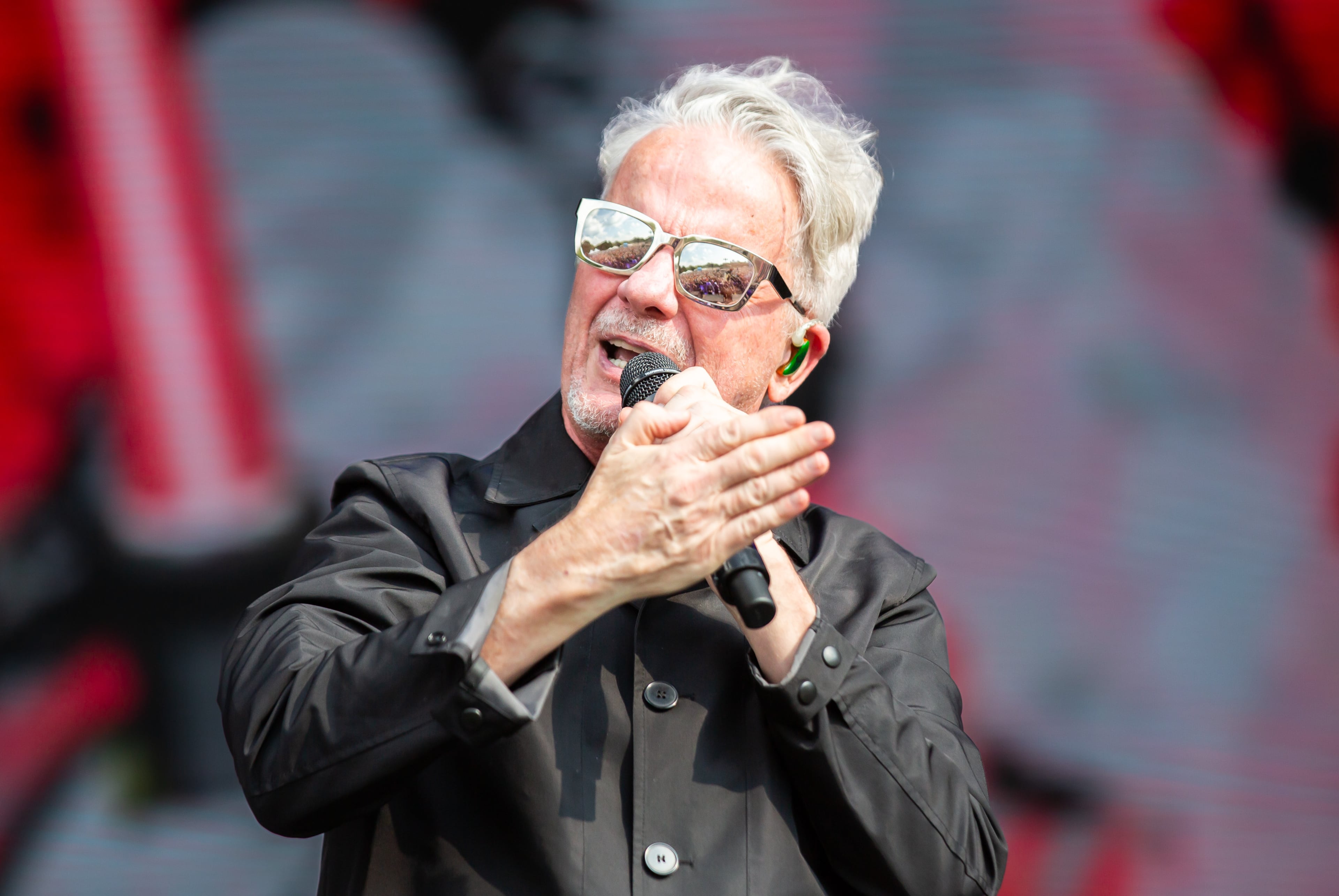 Atlanta, Ga. — New wave legends Devo took the Peachtree Stage and played classics like "Whip It" for adoring fans on Sunday, Sept. 21, 2025, at Piedmont Park. (RYAN FLEISHER FOR THE ATLANTA JOURNAL-CONSTITUTION)