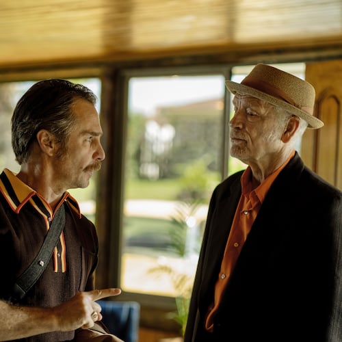 This image released by Searchlight Pictures shows Sam Rockwell, left, and John Malkovich in a scene from "Wild Horse Nine." (Diego Araya Corvalán/Searchlight Pictures via AP)