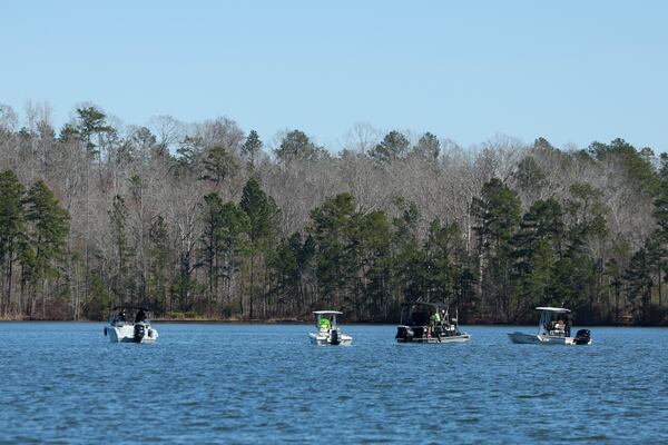 Members of local law enforcement agencies search for Gary Jones on Lake Oconee, Friday, February, 14, 2024, northeast of Eatonton. The Putnam County sheriff is investigating and searching after Spelman College instructor Joycelyn Nicole Wilson and an Atlanta private school coach Gary Jones went missing on Lake Oconee over the weekend. The body of Wilson was found Sunday and Jones has not been found. (Jason Getz / AJC)