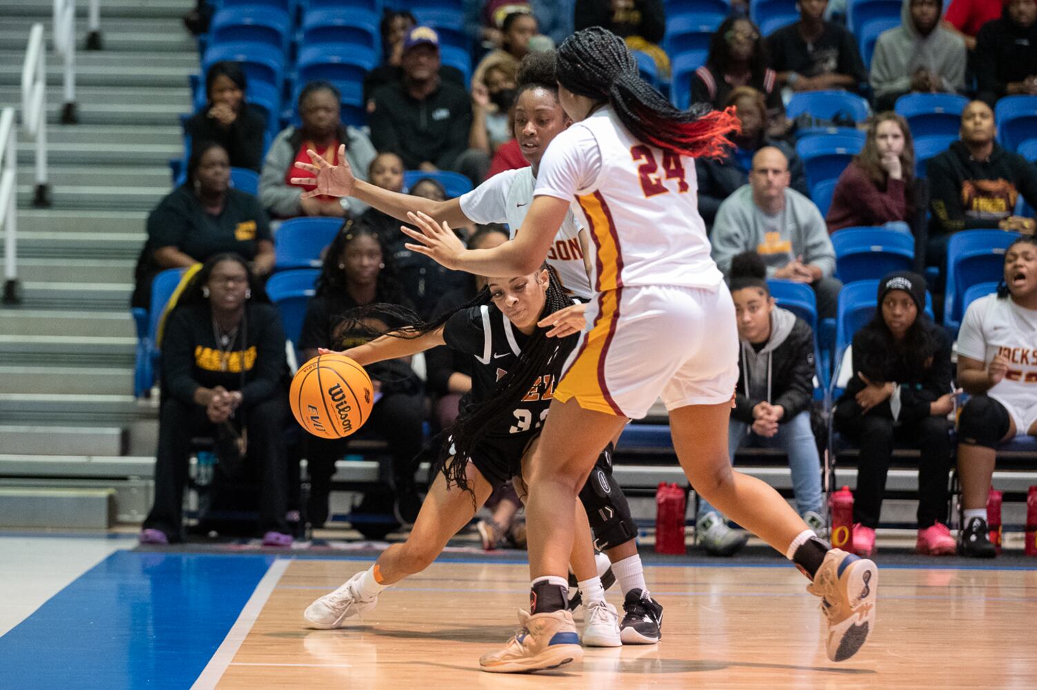 Kell's Crystal Henderson is defended by Jackson. Jamie Spaar for the Atlanta Journal-Constitution