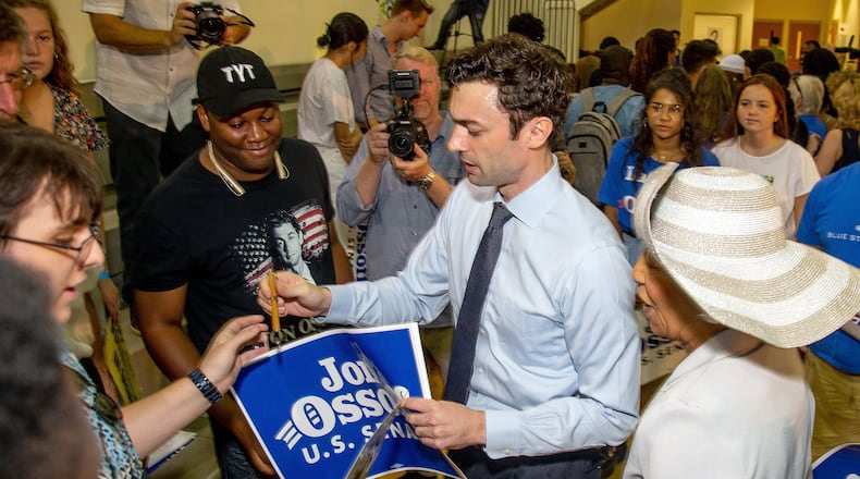 Jon Ossoff , Democratic candidate for one of Georgia's U.S. Senate seats, signs autographs during a voter registration rally at the MLK Recreation Center in Atlanta on Saturday, September 28, 2019. (Photo: STEVE SCHAEFER / SPECIAL TO THE AJC)