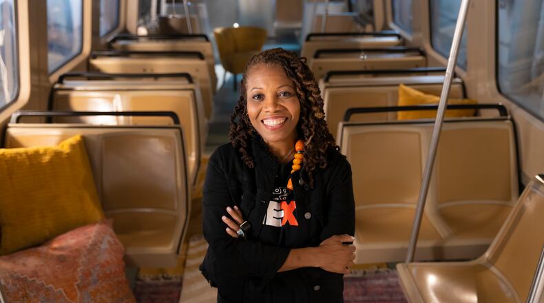 Faith Carmichael, co-founder of the NEXT Movement, pictured on a MARTA railcar. The organizations partnered for the filming "The NEXT Movement, Season One," premiering this month on PBS. (Photo by Terence Rushin)
