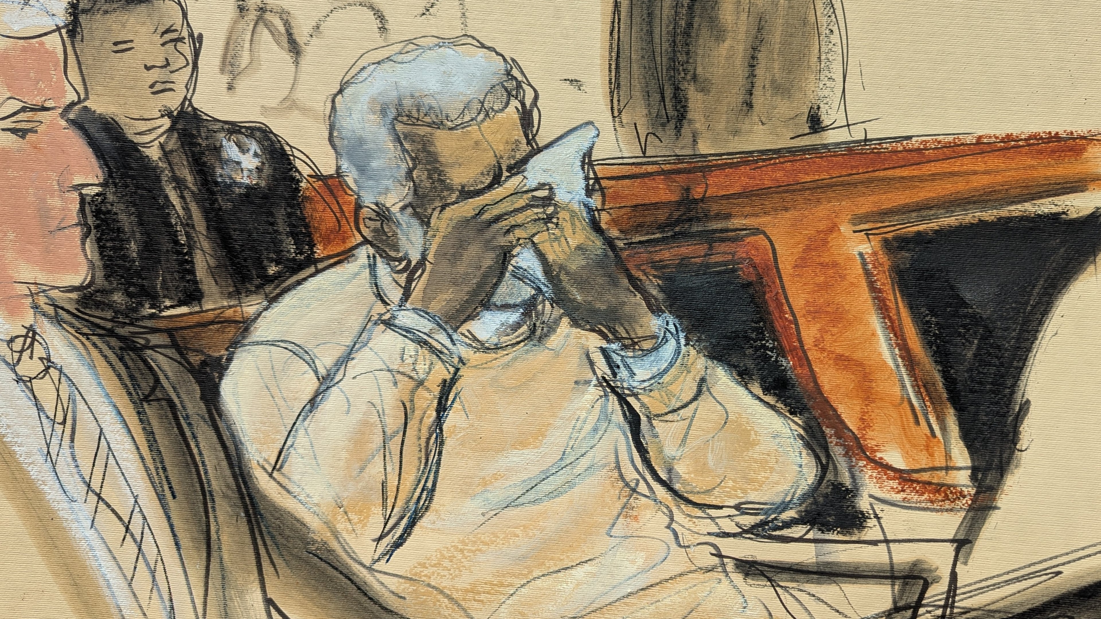 In this courtroom sketch, Sean Diddy Combs breaks down and cries during the playing of a video about his life during his sentencing hearing in Manhattan federal court, Friday, Oct. 3, 2025, in New York. (Elizabeth Williams via AP)