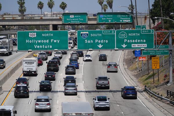 Traffic converges on a freeway Thursday, May 22, 2025, in Los Angeles. (AP Photo/Jae C. Hong)