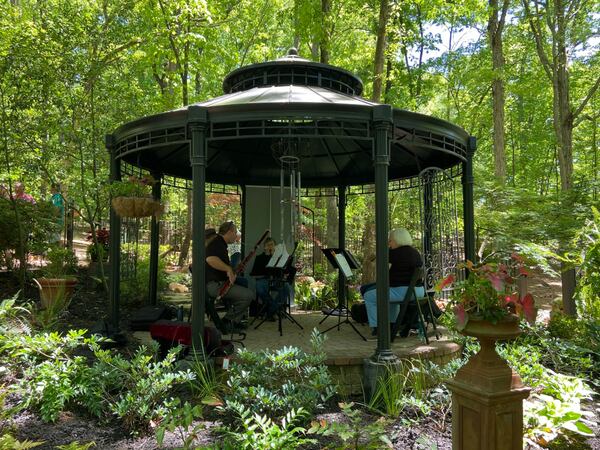 Get some ideas for your garden from the Secret Gardens Tour in Johns Creek on Saturday, May 9. It includes musicians and visual artists at stops. (Photo courtesy of Secret Gardens Tour)