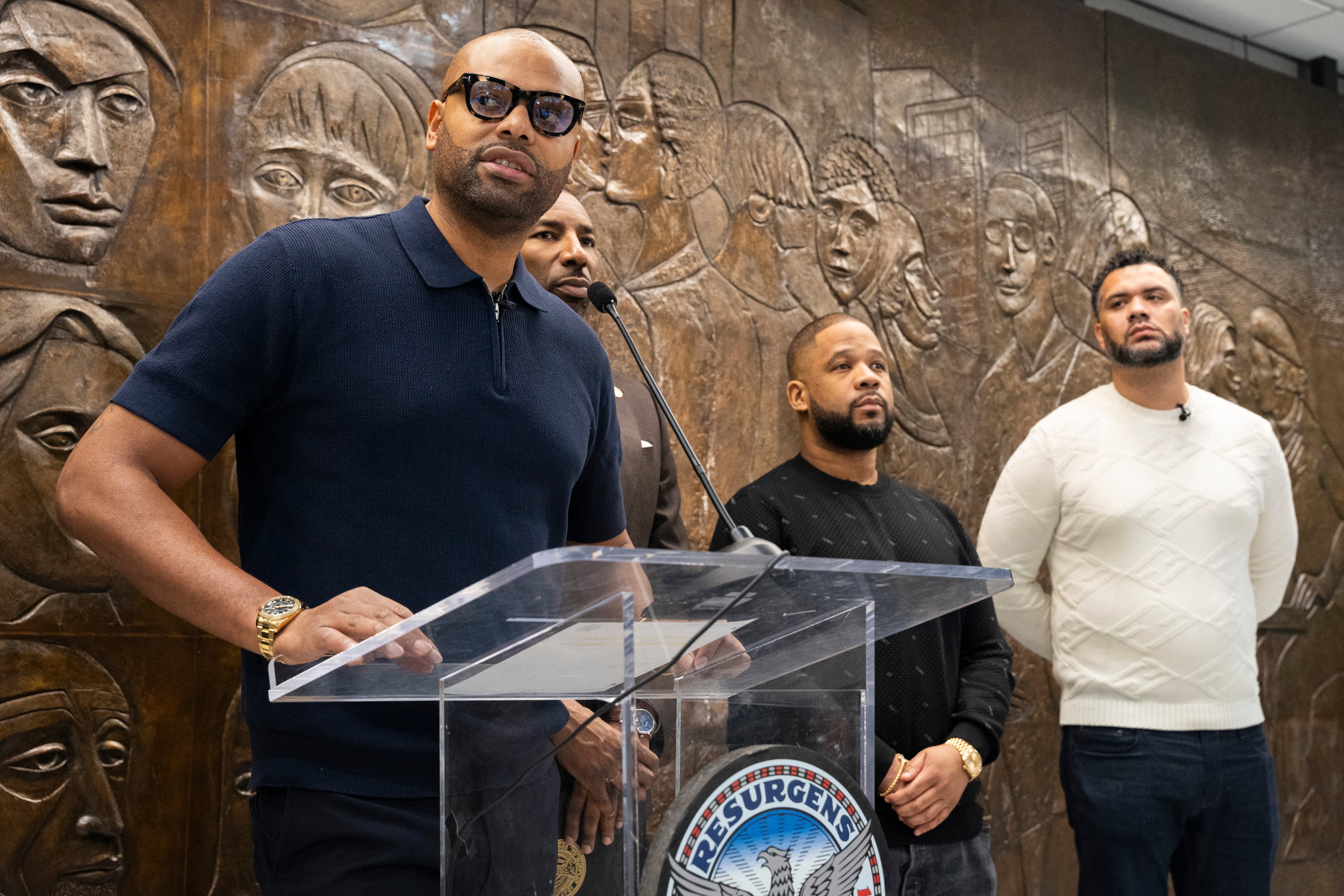 Rashad Bilal, co-founder of Earn Your Leisure and Invest Fest, announces the details for last year's Invest Fest at Atlanta City Hall on Friday, March 22, 2024. (Olivia Bowdoin for the AJC)