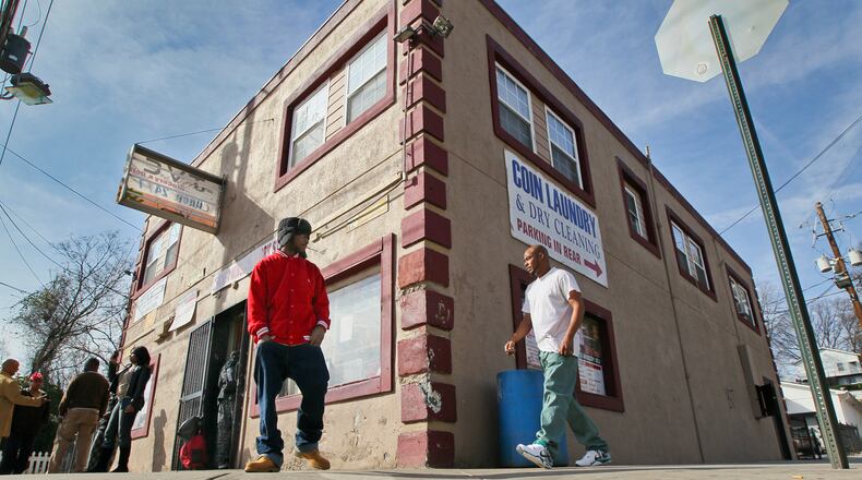 The notorious Pink Store on McDaniel Street, pictured here in 2012, has been the scene of two murders in two months. Police recently launched an effort to “take back” the corner. JONN SPINK / JSPINK@AJC.COM