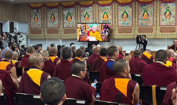 Buddhist monks of various schools of Tibetan Buddhism watch a recorded video message by Tibetan spiritual leader the Dalai Lama in Dharamshala, India, Tuesday, July 2, 2025, ahead of his birthday according to the Gregorian calendar on July 6. (AP Photo/Ashwini Bhatia)