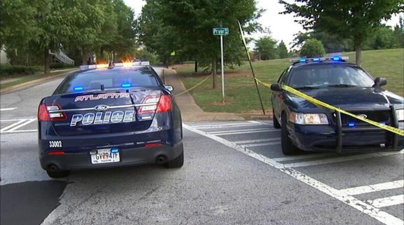 Atlanta police shut down Pryor Road Thursday evening after a woman was struck and killed by a car. (Credit: Channel 2 Action News)