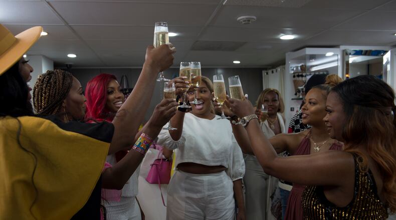 THE REAL HOUSEWIVES OF ATLANTA -- Pictured: (l-r) Marlo Hampton, Cynthia Bailey, Porsha Williams, NeNe Leakes, Eva Marcille, Kandi Burruss -- (Photo by: Jason Koerner/Bravo)