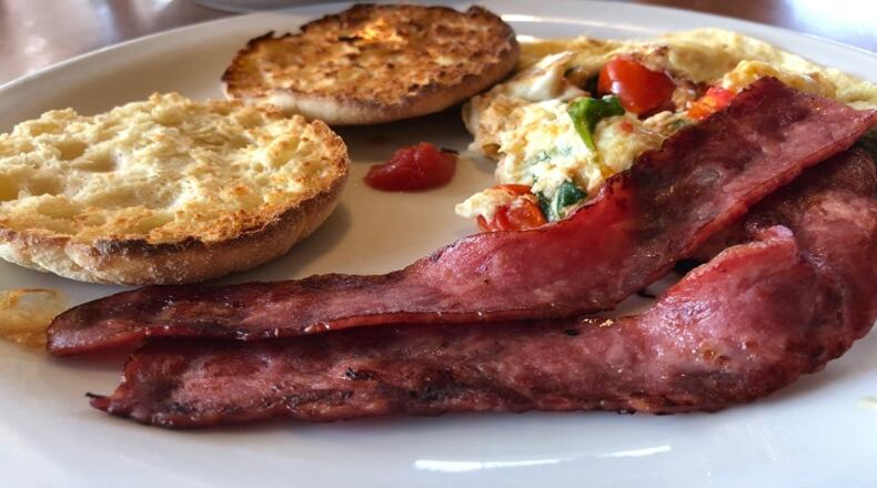 The Lightspeed Slam features egg whites, hard melon, wizened strips of turkey bacon and barely toasted English muffins. (Chris Borrelli/Chicago Tribune/TNS)