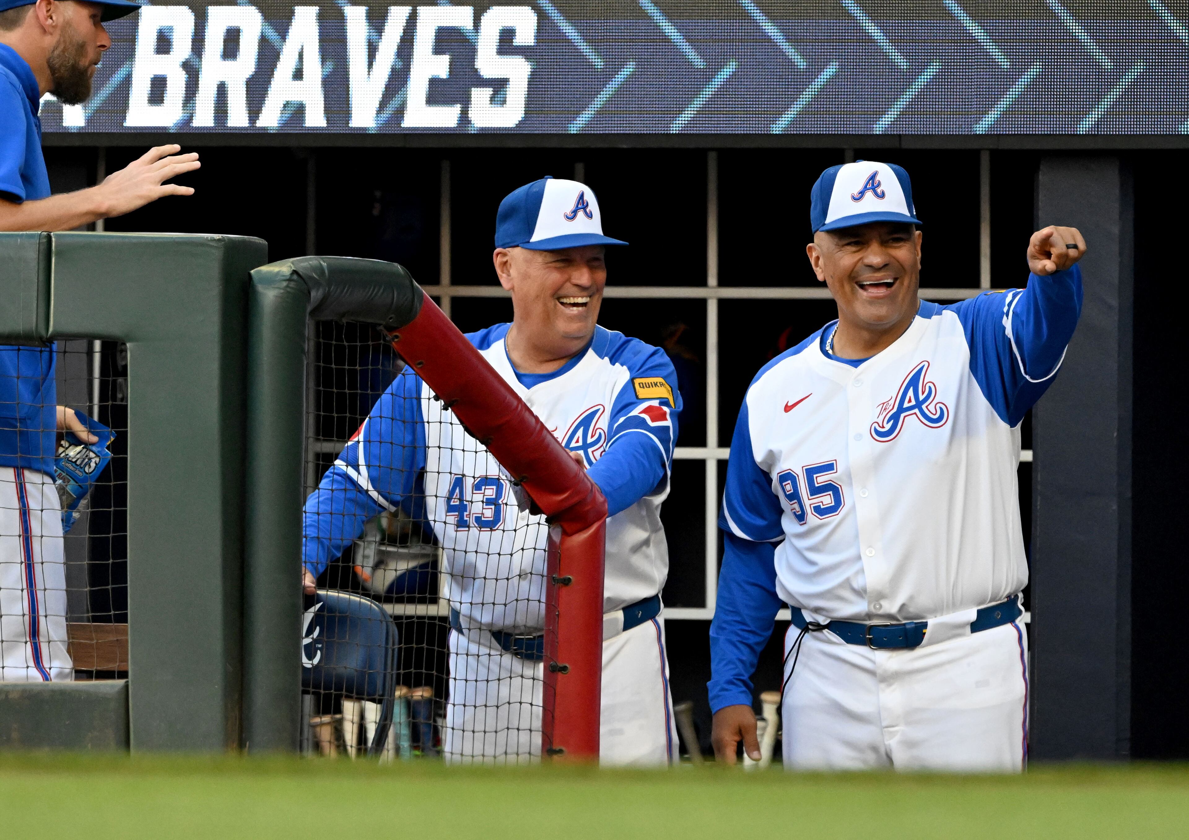 Braves coach Eddie Perez (right) and manager Brian Snitker during an April pointing incident unrelated to Saturday's events.