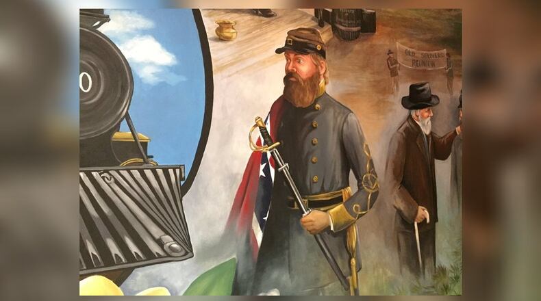 A mural that depicts a soldier with a Confederate flag has become controversial in Tyrone. (Credit: Channel 2 Action News)