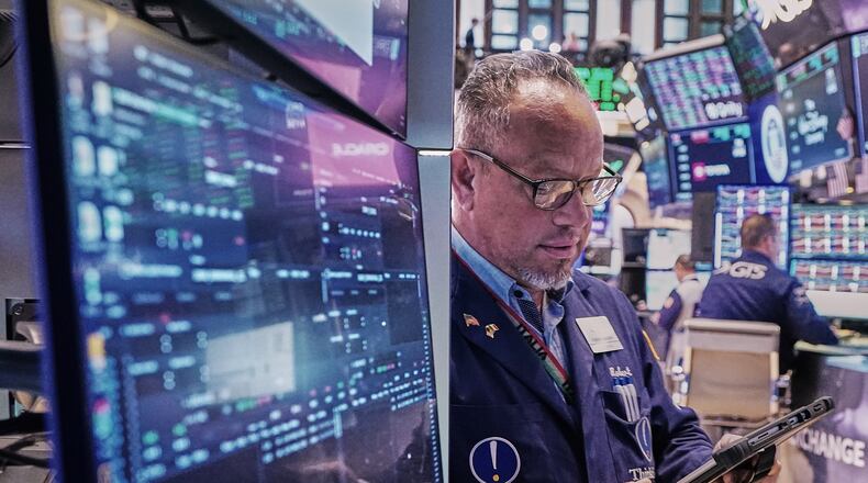 Trader Robert Arciero works on the floor of the New York Stock Exchange, Friday, May 22, 2026. (AP Photo/Richard Drew)