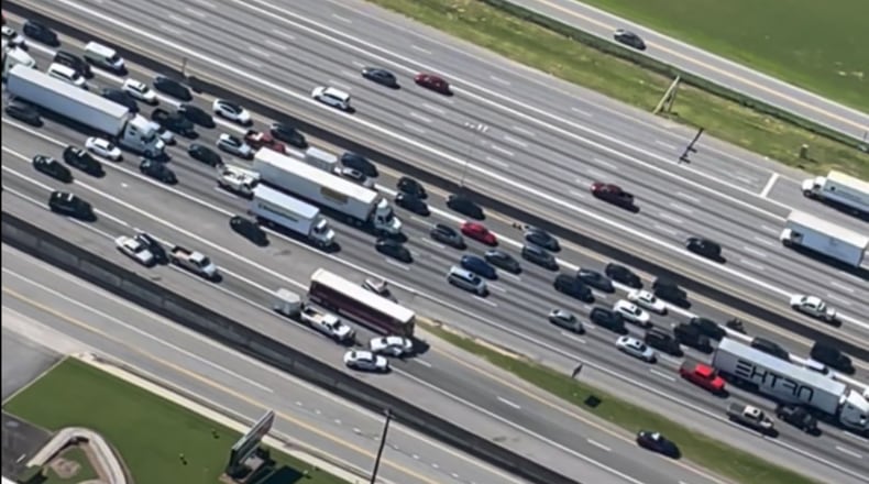 A hijacked Gwinnett County bus plows into police cruisers trying to stop it on the I-85/northbound ramp to Jimmy Carter Boulevard on June 12th, 2024. Credit: Doug Turnbull, WSB Skycopter