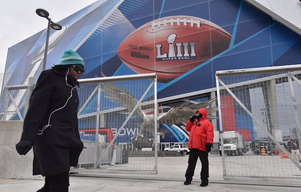 Security staff are visible around Mercedes-Benz Stadium on Thursday, Jan. 24, 2019. HYOSUB SHIN / HSHIN@AJC.COM