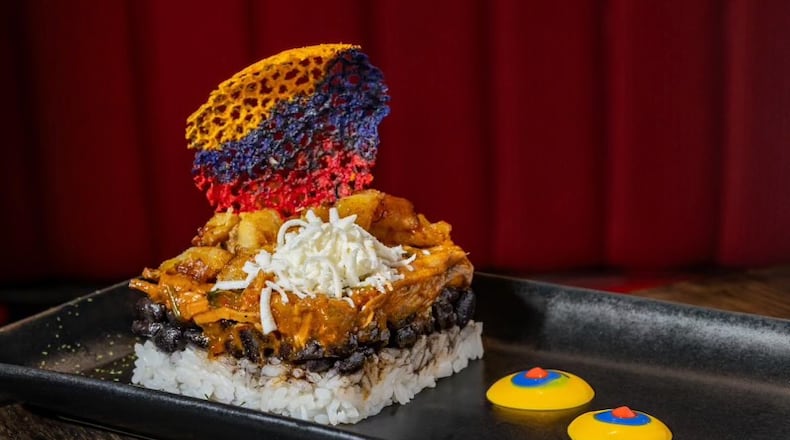 The Pabellón Tower at Arepa Grill Kitchen & Wine in Roswell is a deconstructed pabellón criollo with shredded beef, black beans, rice, plantains and a crispy arepa.
