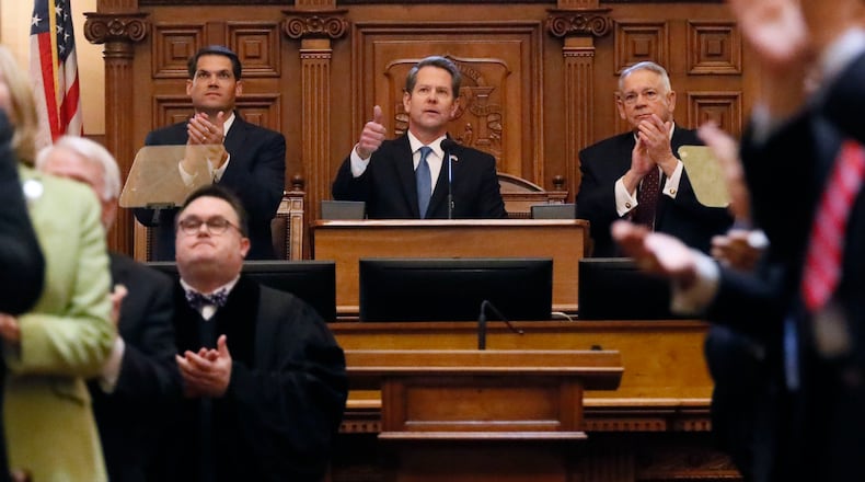 Gov. Brian Kemp, flanked by Lt. Gov. Geoff Duncan (left) and House Speaker David Ralston, delivered his first State of the State address Thursday, Jan. 17, 2019, revealing his proposal for a $3,000 teacher pay raise and an additional $8.4 million for Apex, a program that provides mental health services to students. BOB ANDRES / BANDRES@AJC.COM