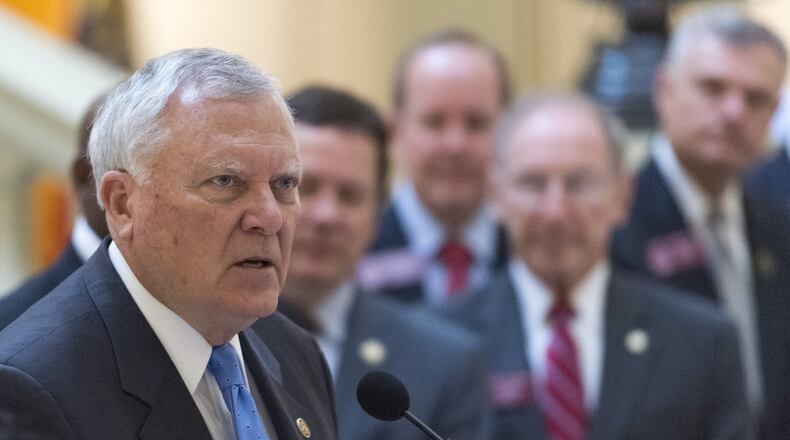 Gov. Nathan Deal speaks before signing several bills, including House Bill 338, in Atlanta, on Thursday. The new law details how the state will intervene in the lowest-performing schools. (DAVID BARNES / DAVID.BARNES@AJC.COM)