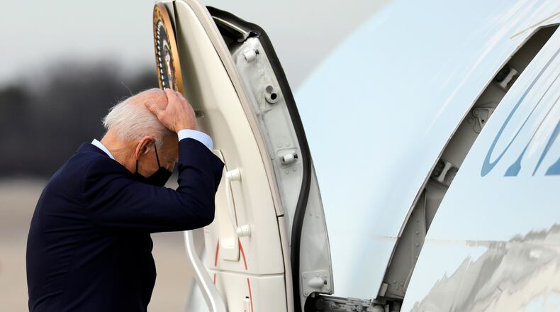 President Joe Biden boards Air Force One at Joint Base Andrews in Maryland in late February. A security breach at the facility in February has prompted an urgent review of procedures.