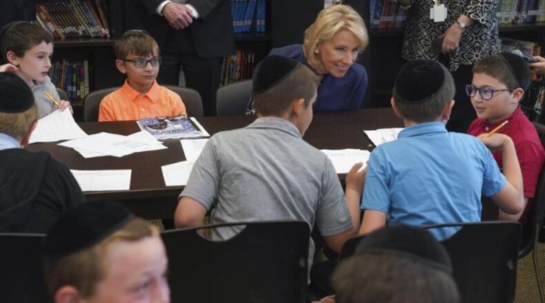 Betsy DeVos, the secretary of education, visits a third grade classroom at Yeshiva Darchei Torah in New York, May 15, 2018. DeVos toured two New York City schools on Tuesday and Wednesday, but the city’s public schools, with their 1.1 million students, were not among them.