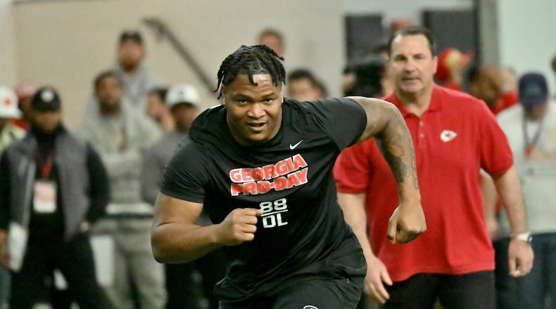 Georgia's defensive lineman Jalen Carter runs in front of coaches and scouts. (Hyosub Shin/The Atlanta Journal-Constitution/TNS)