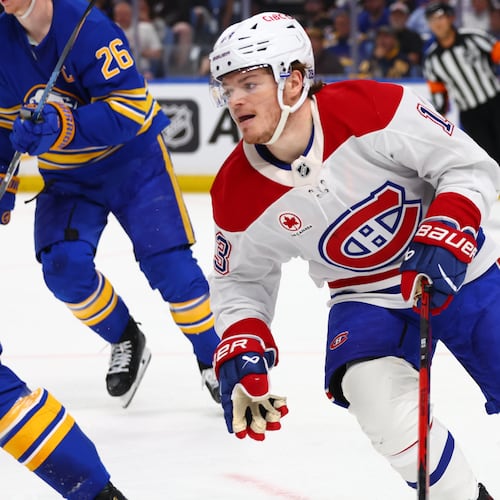 Montreal Canadiens right wing Cole Caufield, right, skates out of the zone during the second period in Game 7 of a second-round NHL hockey Stanley Cup playoff series against the Buffalo Sabres Monday, May 18, 2026, in Buffalo, N.Y. (AP Photo/Jeffrey T. Barnes)