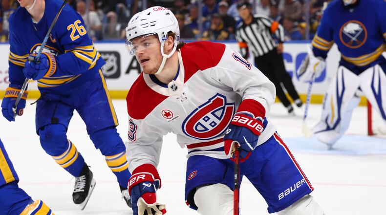 Montreal Canadiens right wing Cole Caufield, right, skates out of the zone during the second period in Game 7 of a second-round NHL hockey Stanley Cup playoff series against the Buffalo Sabres Monday, May 18, 2026, in Buffalo, N.Y. (AP Photo/Jeffrey T. Barnes)