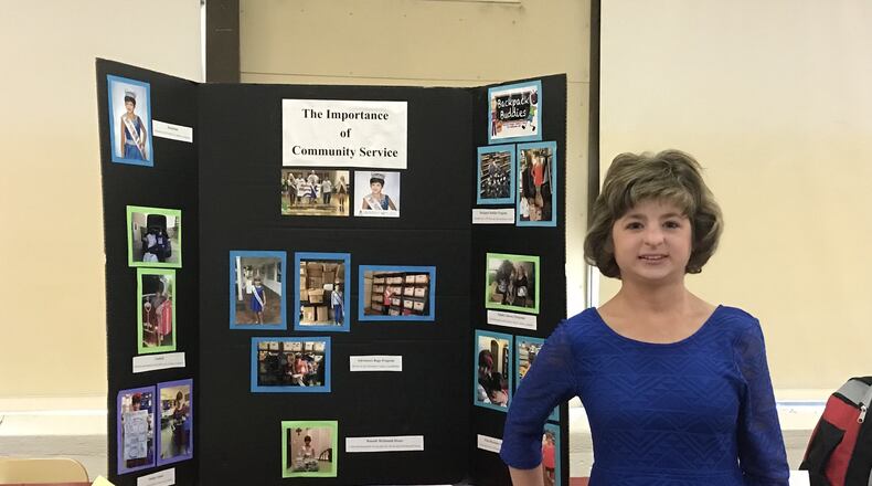 Kelsey Norris puts on a workshop on the importance of community service projects for a group of elementary and middle school students in Cochran. CONTRIBUTED